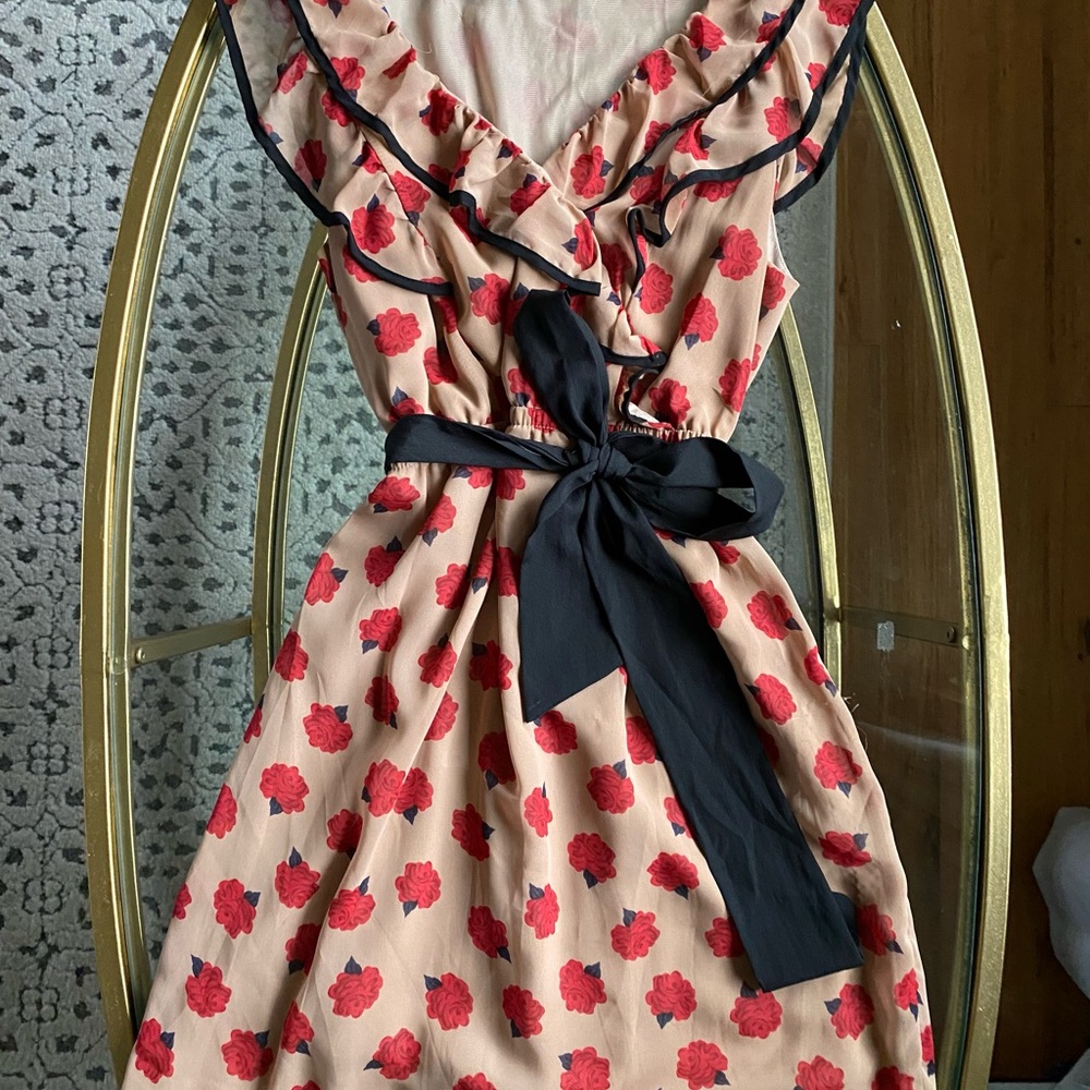 Spring Floral Dress with Ruffles and a Wrap Waist